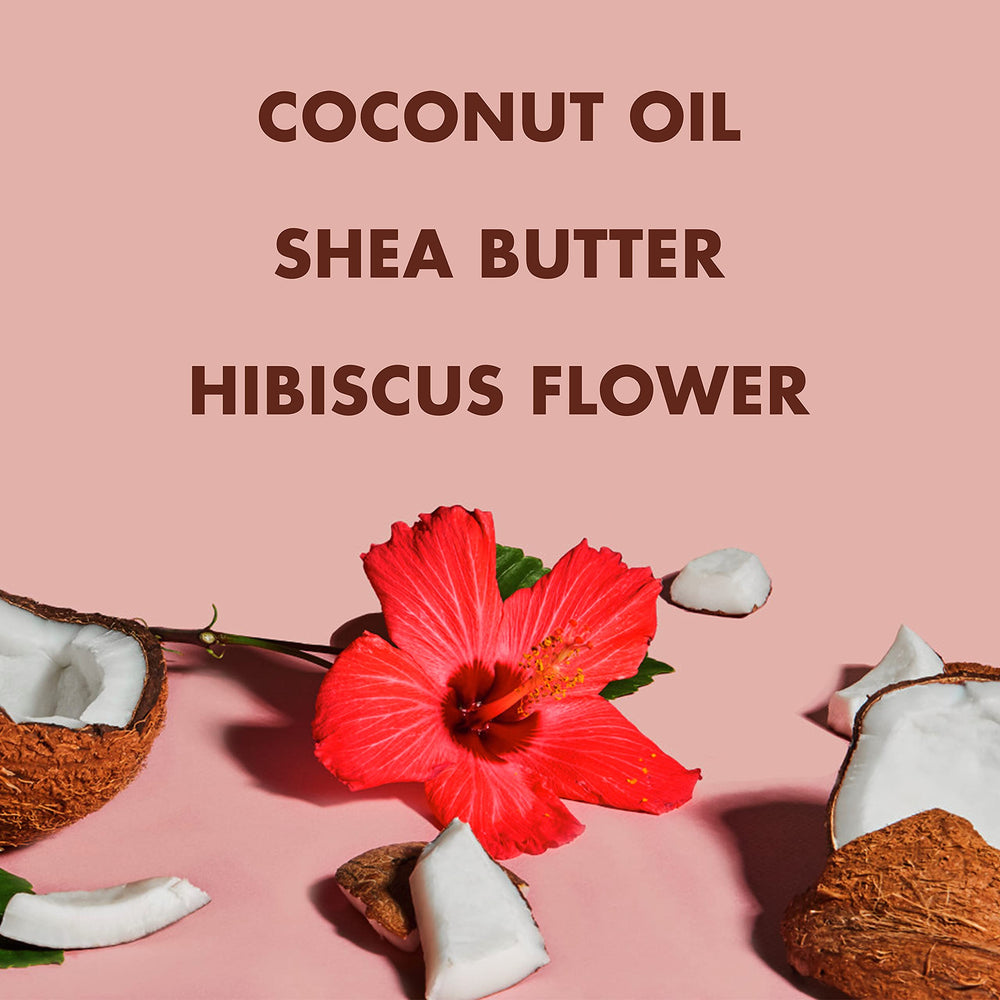Shea Moisture oil poured into hands for smooth massage application