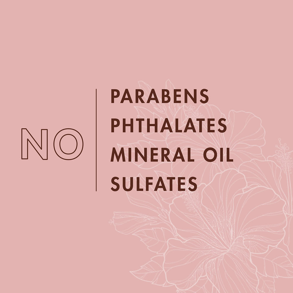 Shea Moisture oil being massaged into skin to show nourishing glide