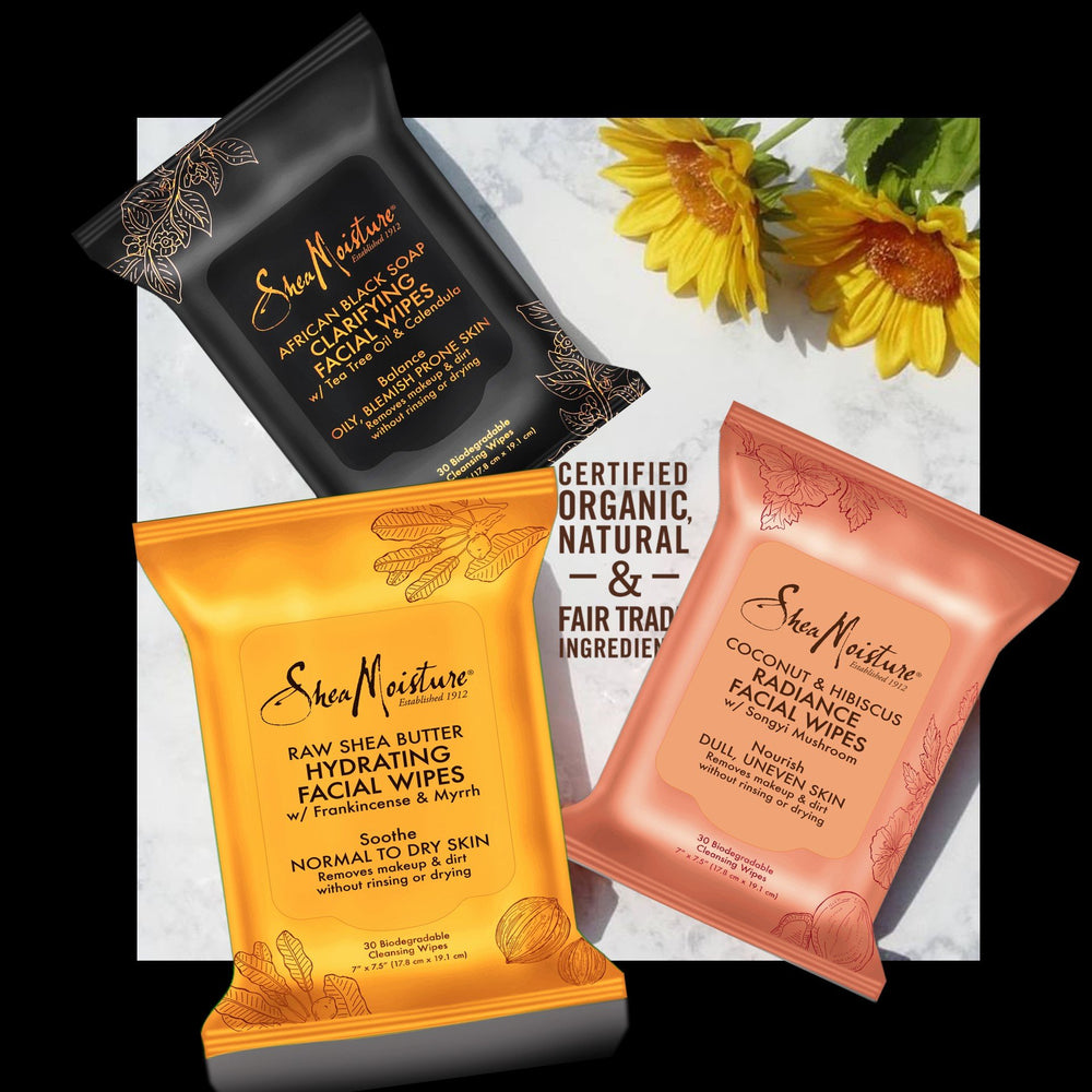 SheaMoisture single wipe in hand illustrating size and on-the-go portability