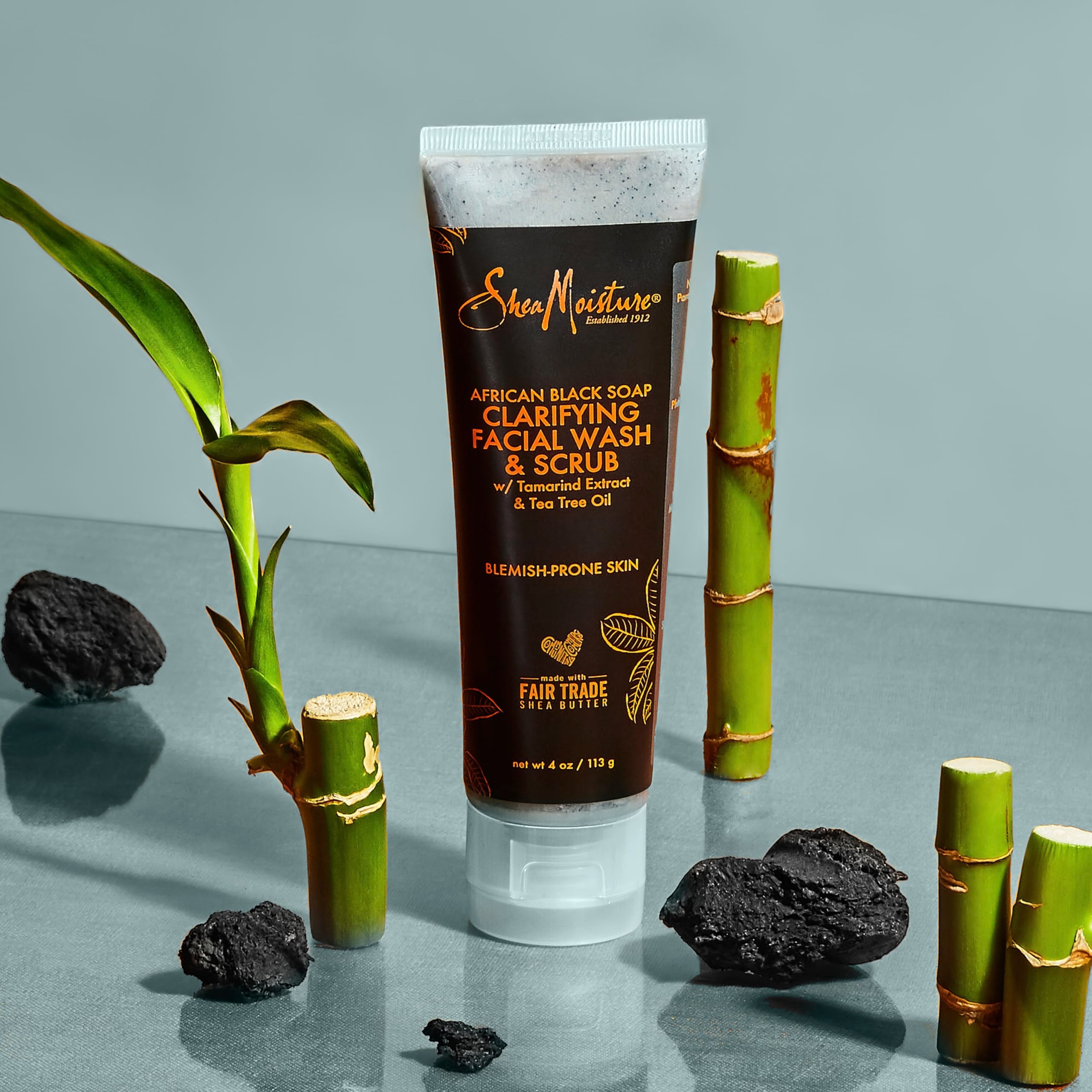 SheaMoisture scrub applied on damp face showing gentle exfoliation