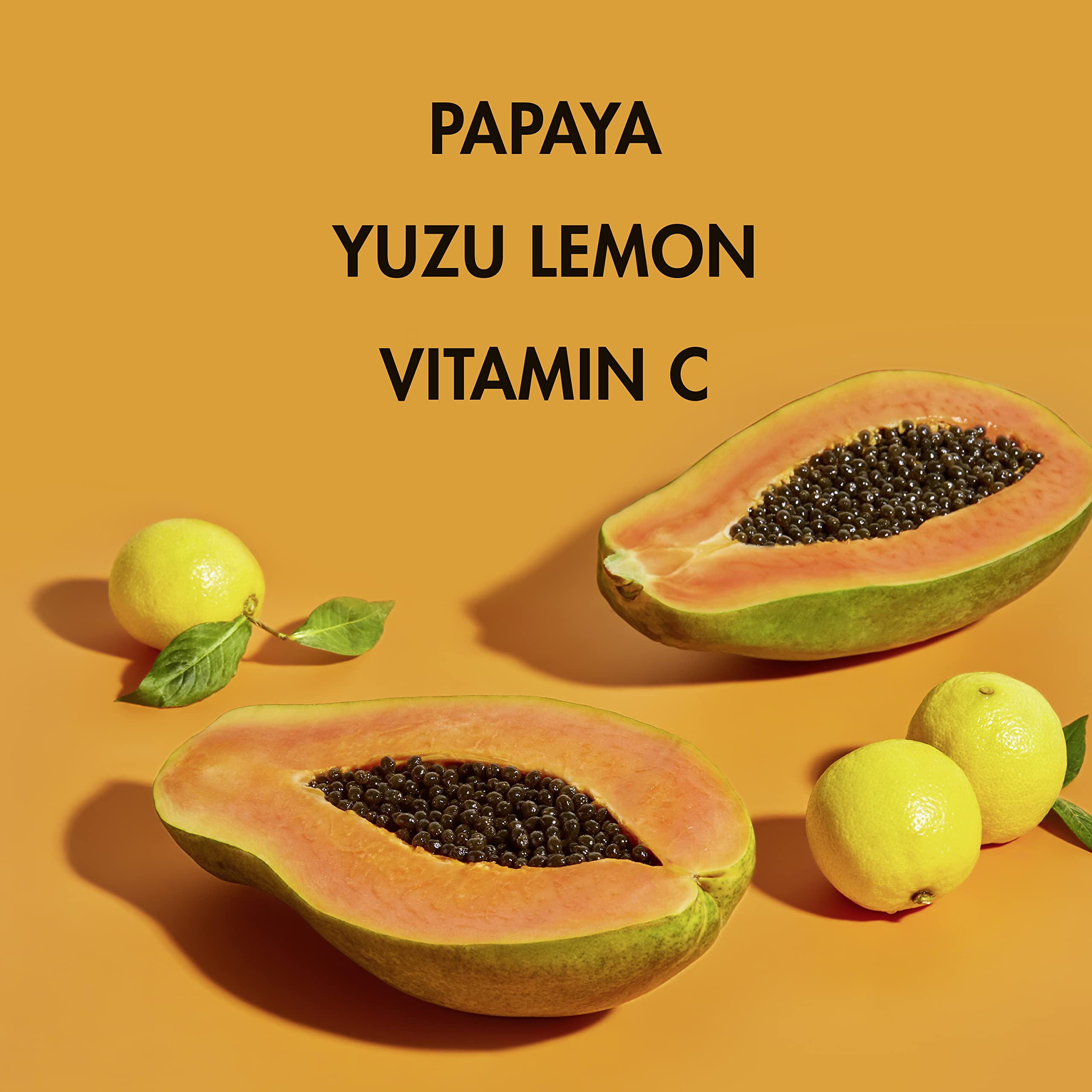 SheaMoisture papaya and yuzu ingredients staged to highlight natural brightening benefit