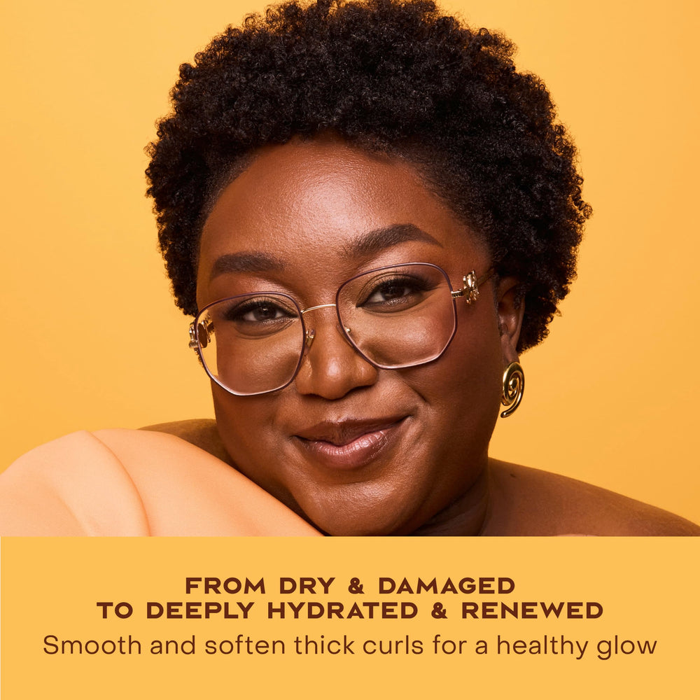 SheaMoisture size in hand to show 11.5 oz scale and convenience