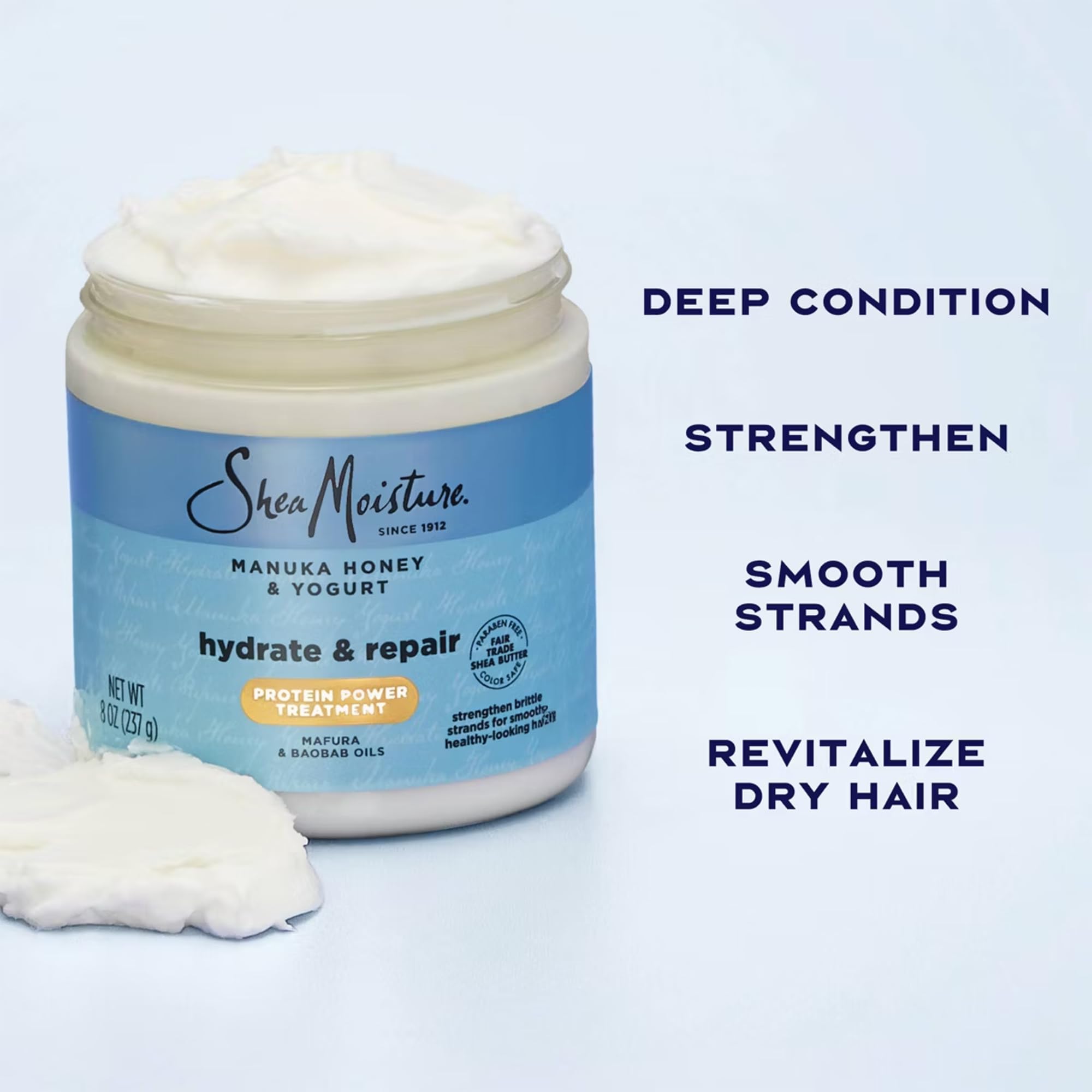 SheaMoisture bottles held in hand for scale showing travel-friendly sizes
