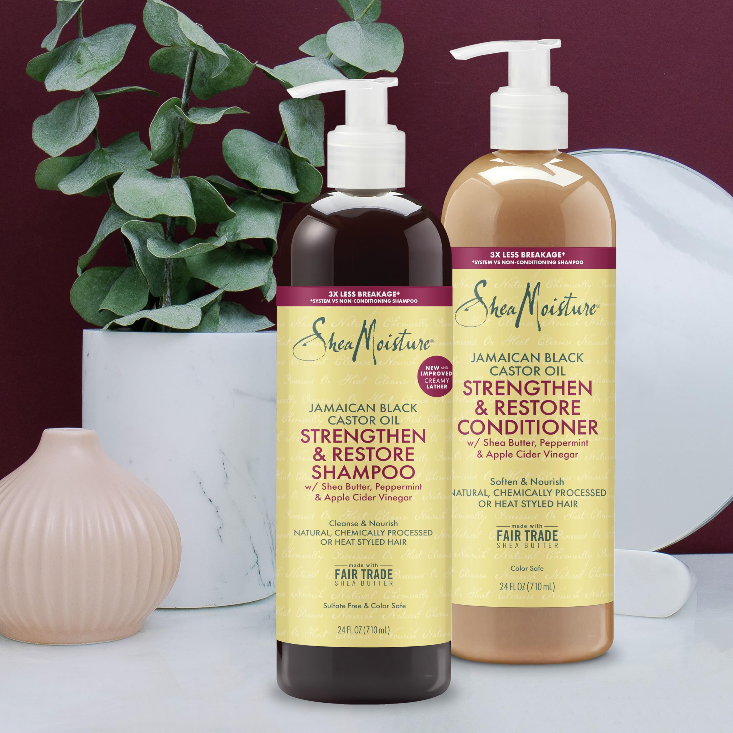 SheaMoisture 24oz bottle next to hand showing scale benefit
