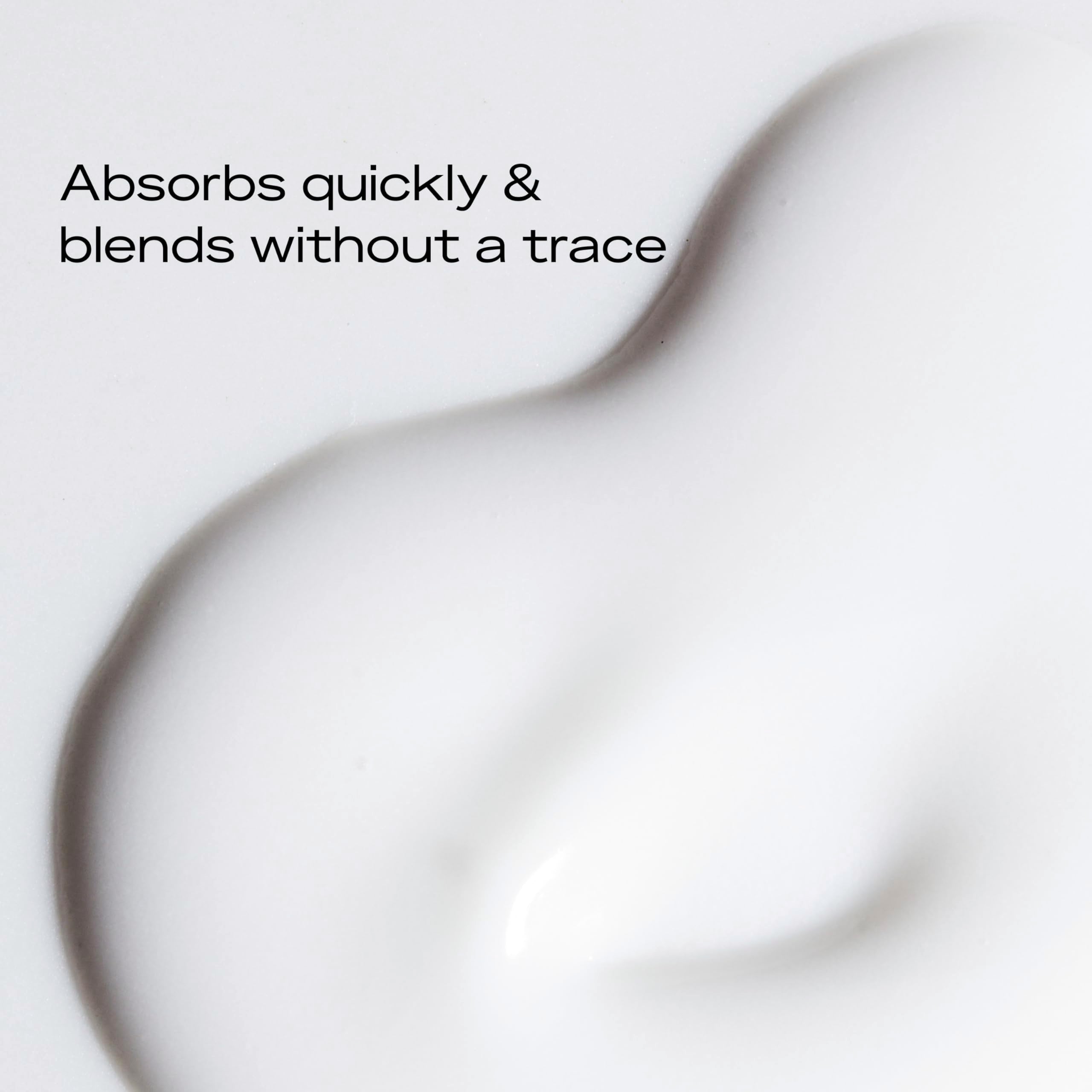 SheaMoisture lotion applied on hand showing quick absorption benefit