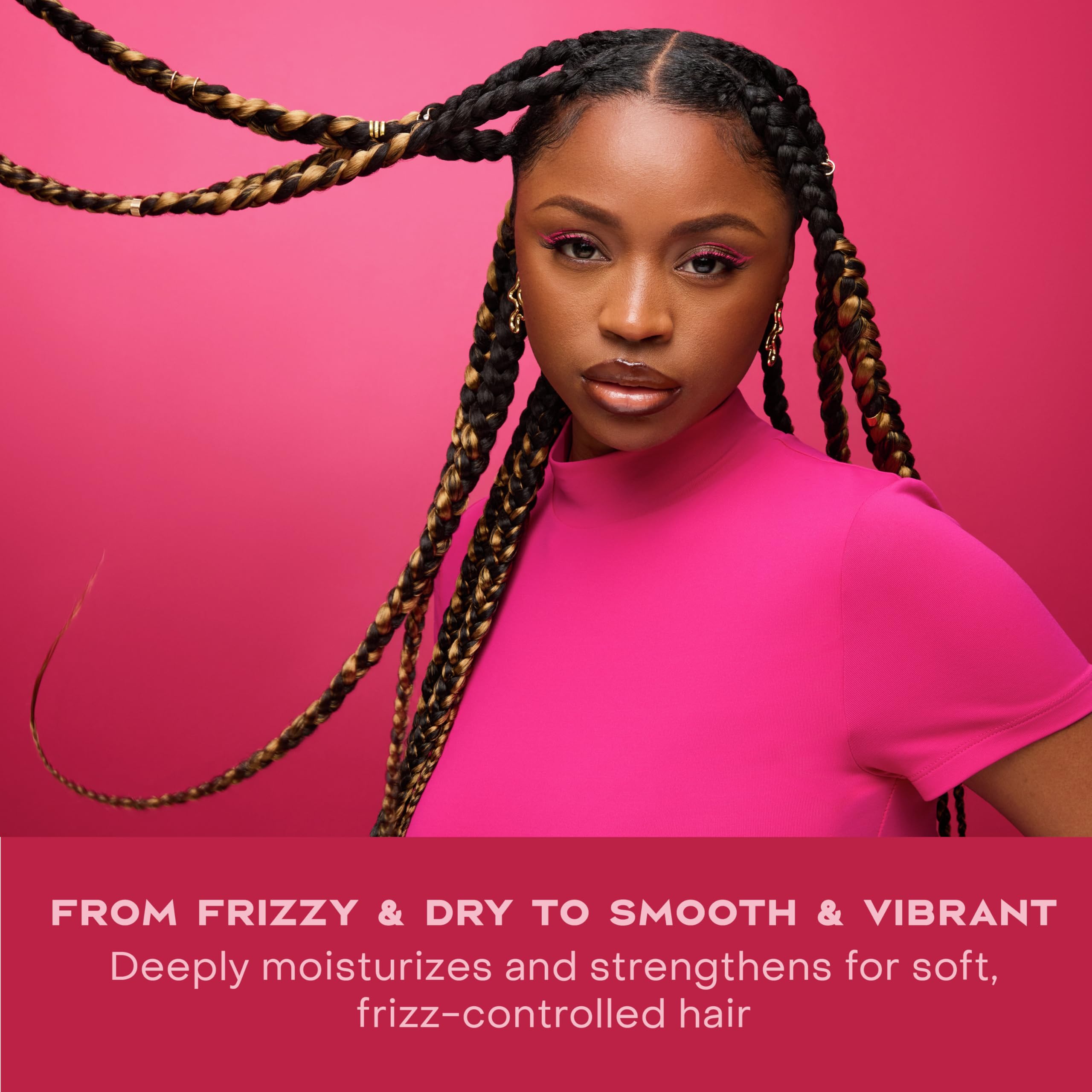 SheaMoisture being worked through wet hair to show detangling and reduced breakage