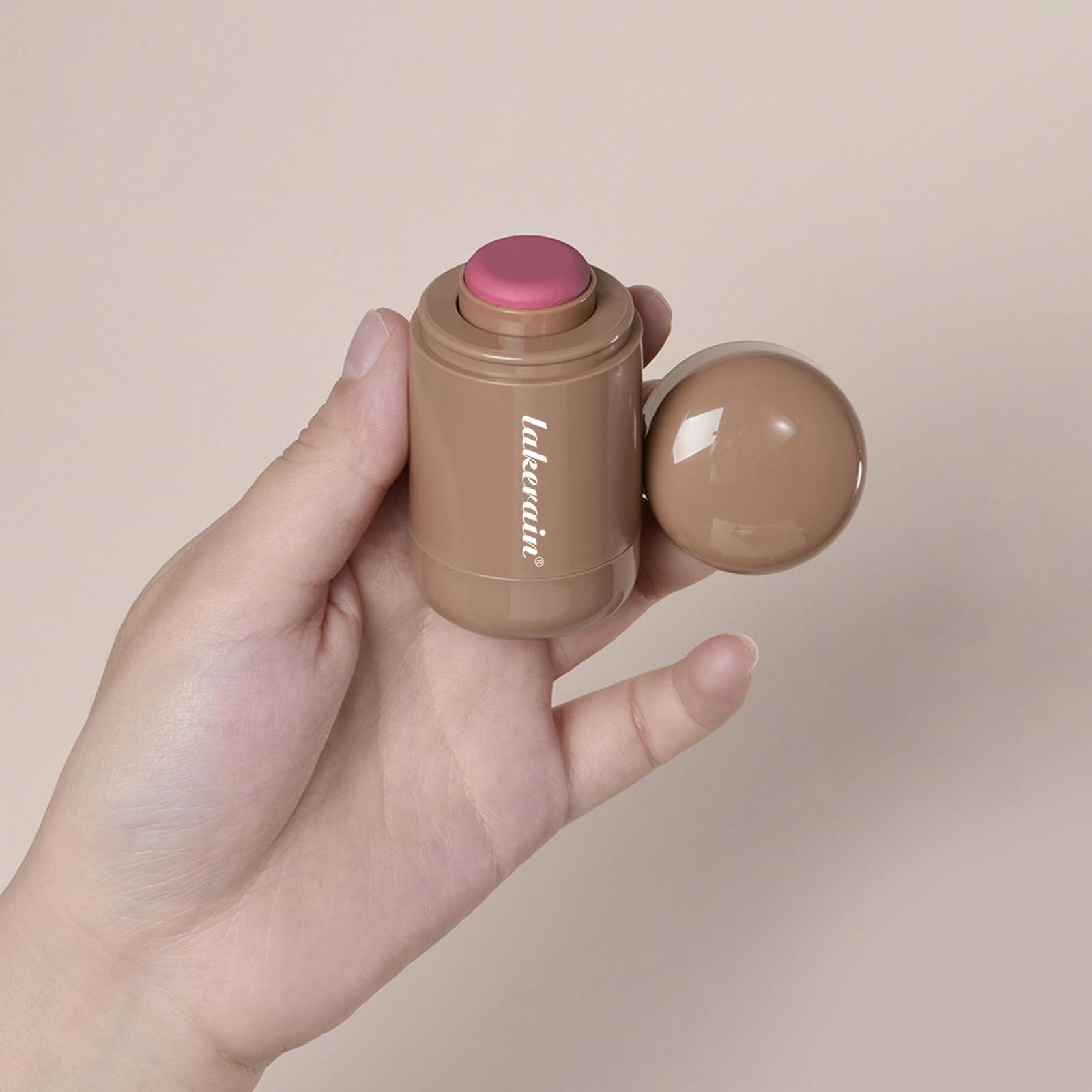 SHEEYOON woman applying blush outdoors showing quick touch-up and on-the-go convenience