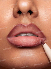 SHEGLAM matte swatch on hand showing rich pigment and true shade