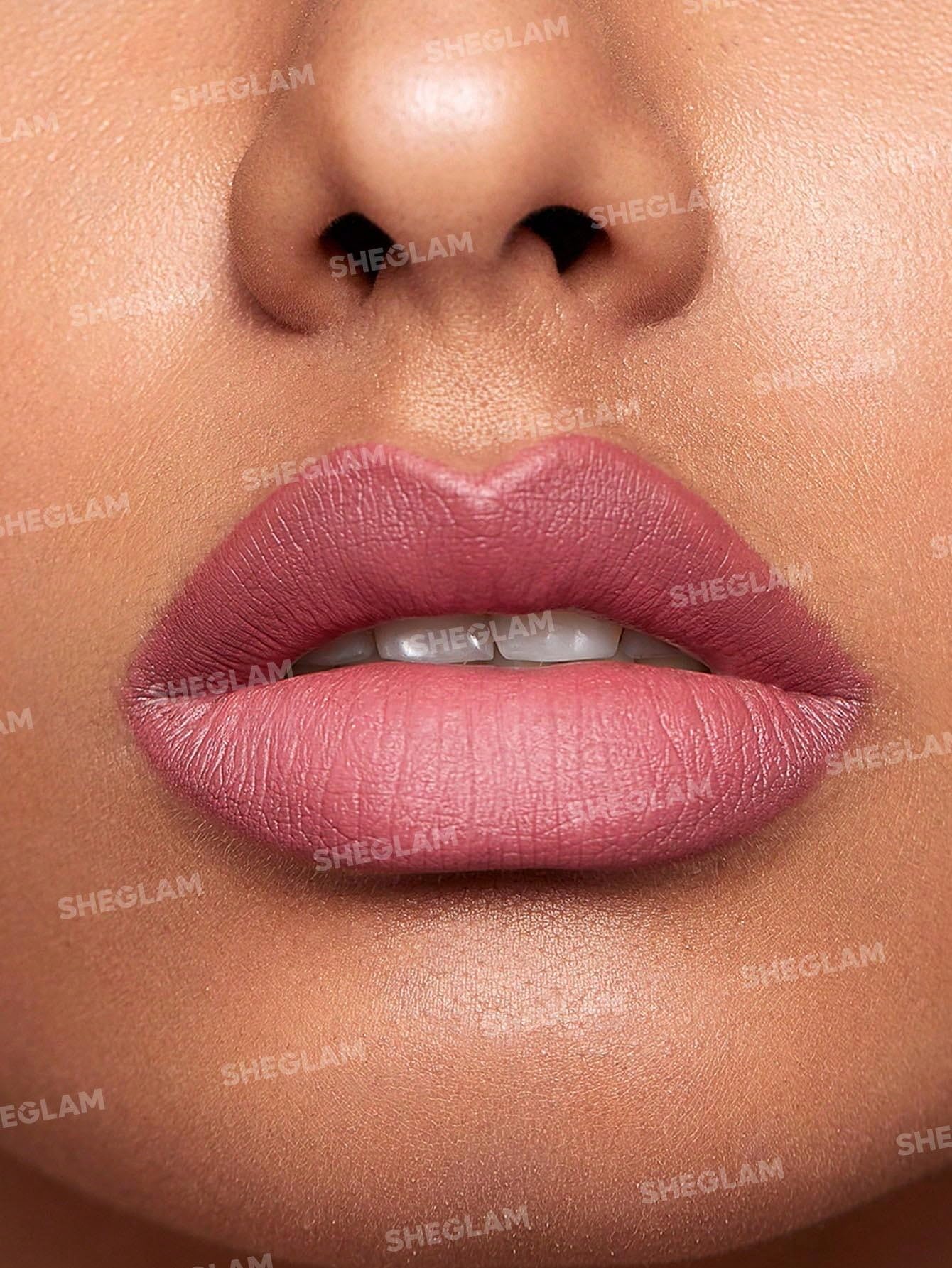 SHEGLAM applied on model lips demonstrating smooth matte finish