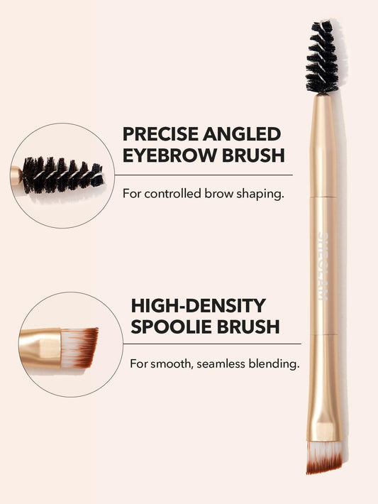SHEGLAM Boss Brow open cream texture swirled on fingertip for smooth application