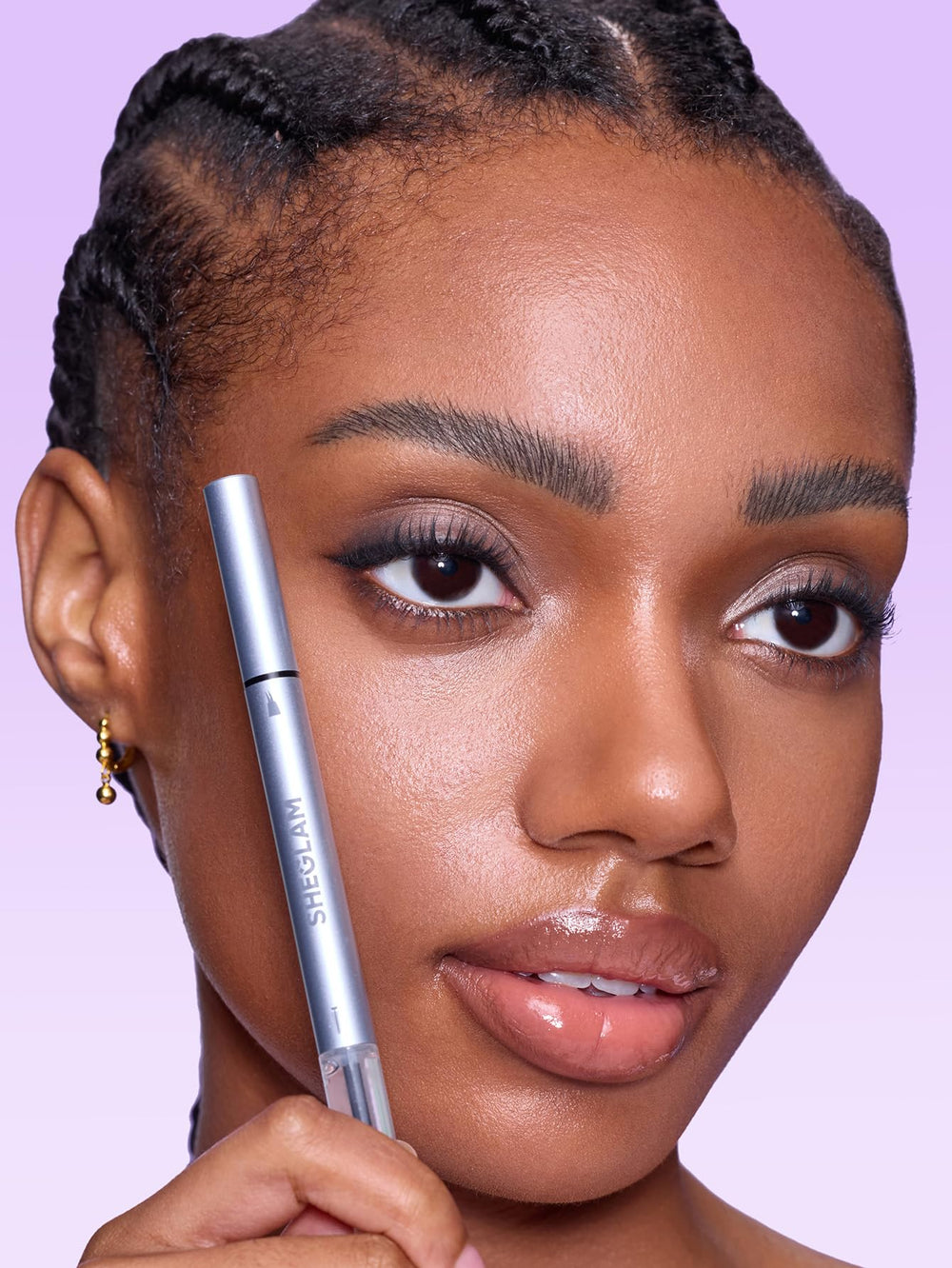 SHEGLAM demo strokes on skin in Espresso showing realistic hair-like definition