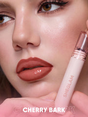 SHEGLAM Cherry Bark peel-off film mid-removal showing long-lasting benefit