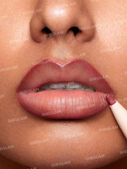 SHEGLAM swatch of Cherry Fudge on arm showing rich matte payoff