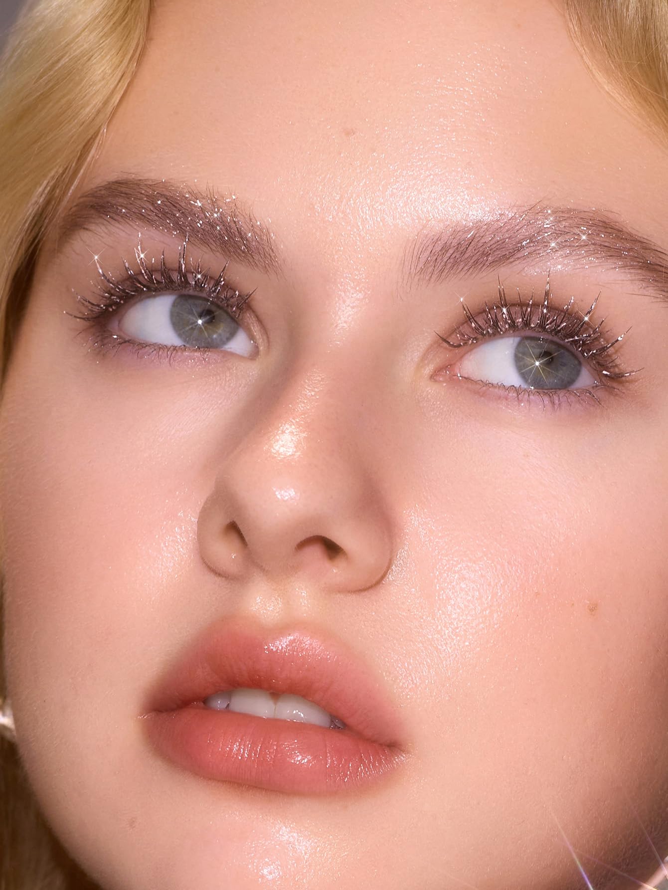 SHEGLAM in evening makeup setting showcasing bold glitter impact
