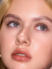 SHEGLAM in evening makeup setting showcasing bold glitter impact