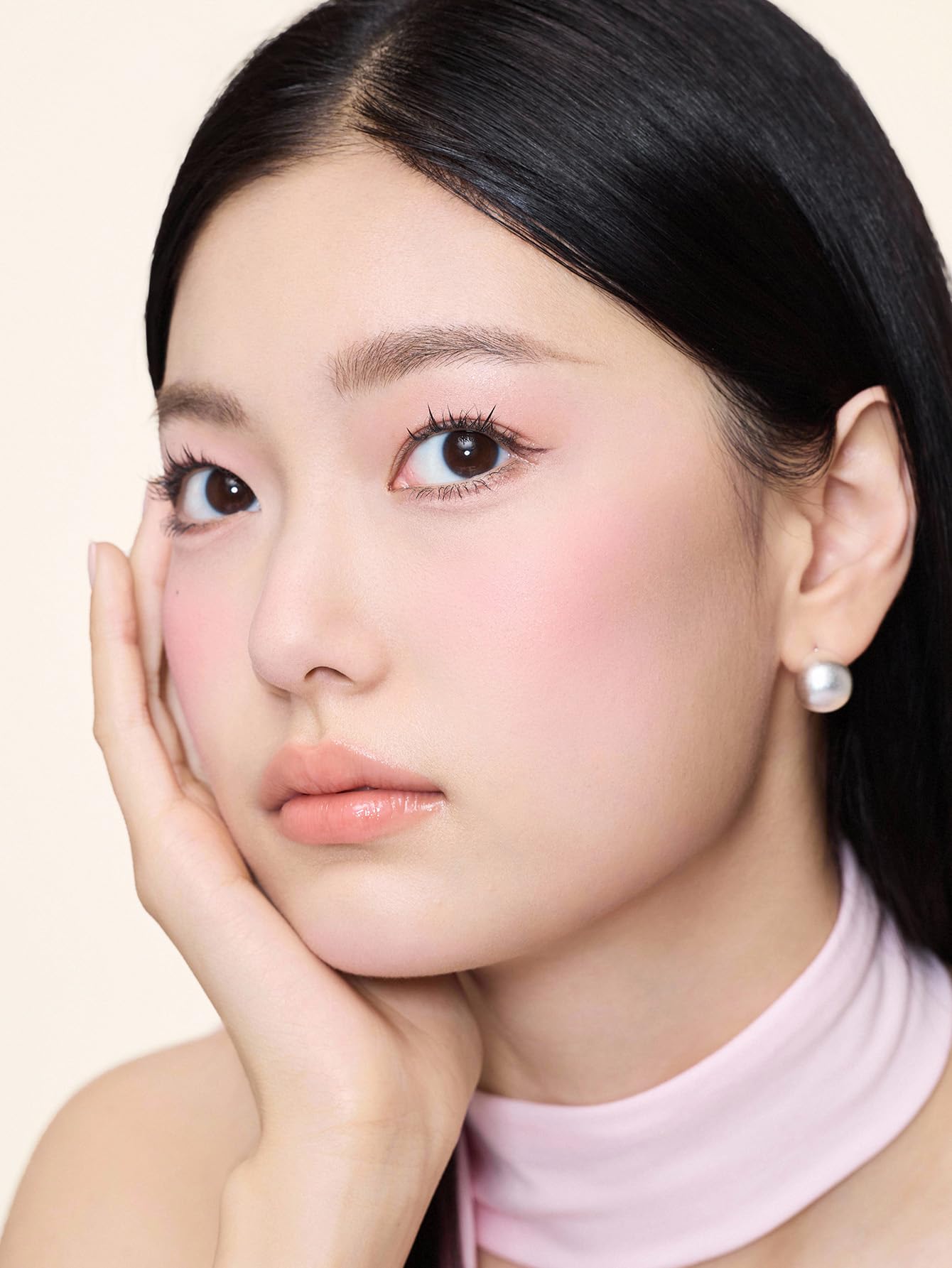 SHEGLAM brush applying blush demonstrating effortless blending benefit