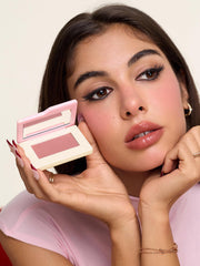 Open pan of SHEGLAM Dream Touch blush displaying smooth pressed surface and color