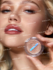 SHEGLAM swatch on arm demonstrating true pigment and reflective finish