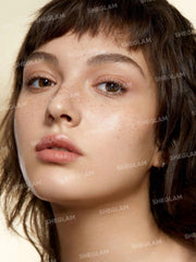 SHEGLAM fawn tint droplet close-up highlighting smooth texture
