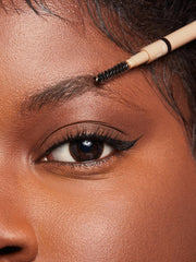 SHEGLAM pencil in use shaping brows for defined, natural-looking arches