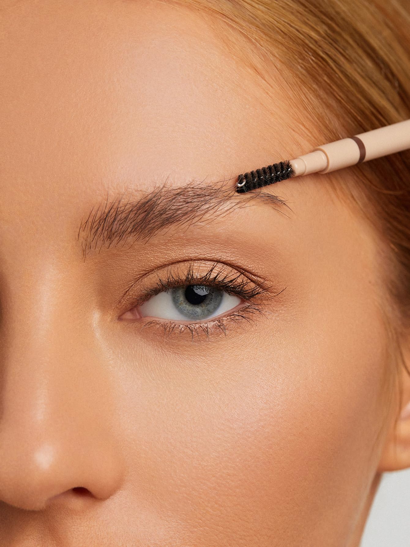 SHEGLAM swatch of blonde shade blended on skin, shows true color payoff