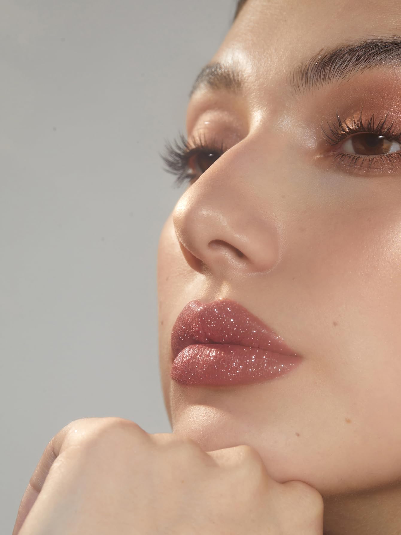 SHEGLAM glitter lips worn on model demonstrating high-shine effect