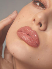 SHEGLAM applied on model for party look demonstrating long-lasting shine