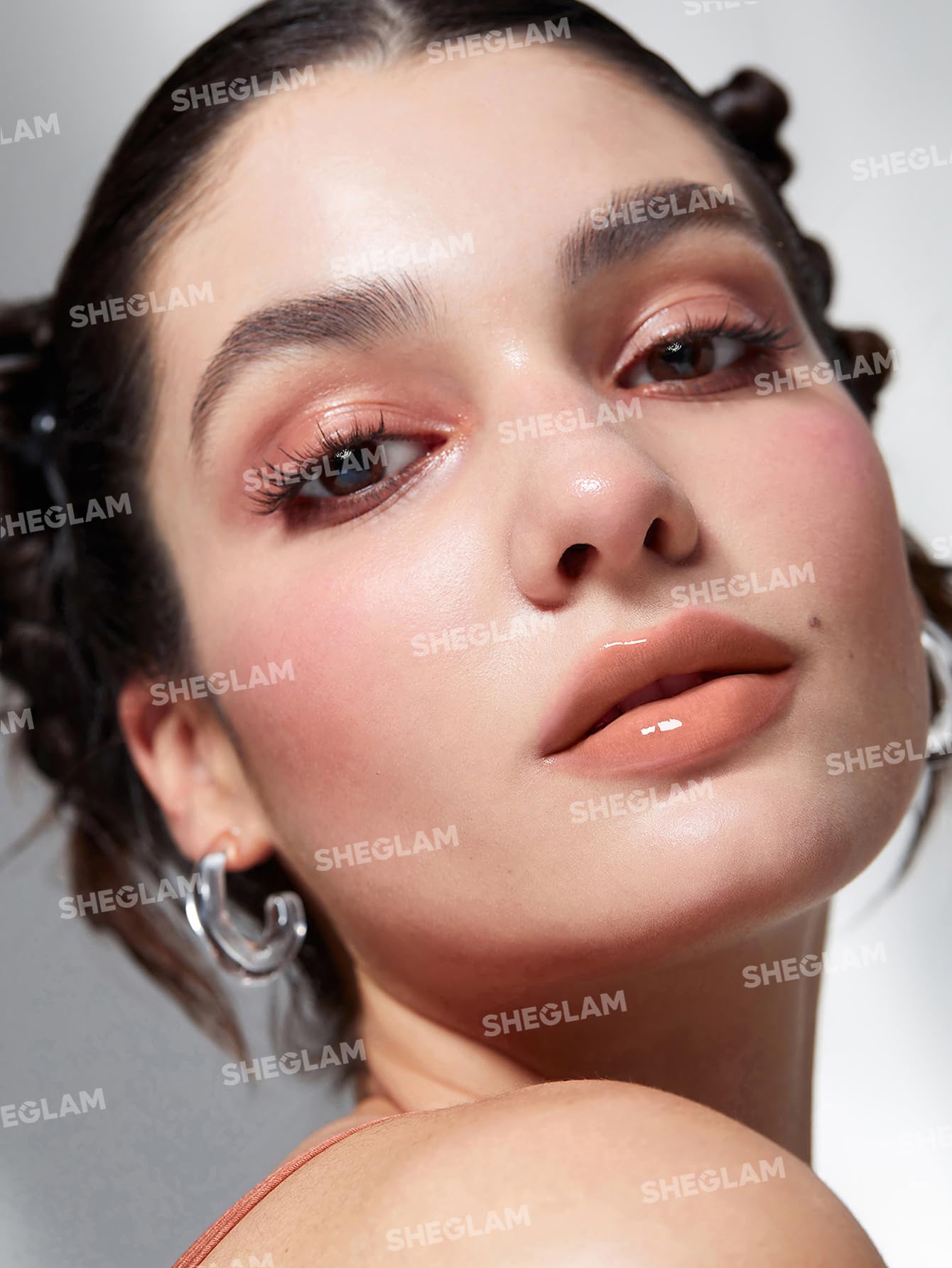 SHEGLAM close-up of solid gloss texture highlighting smooth, non-sticky finish