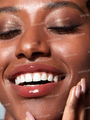 SHEGLAM PoutPerfect texture closeup showing smooth non sticky finish benefit