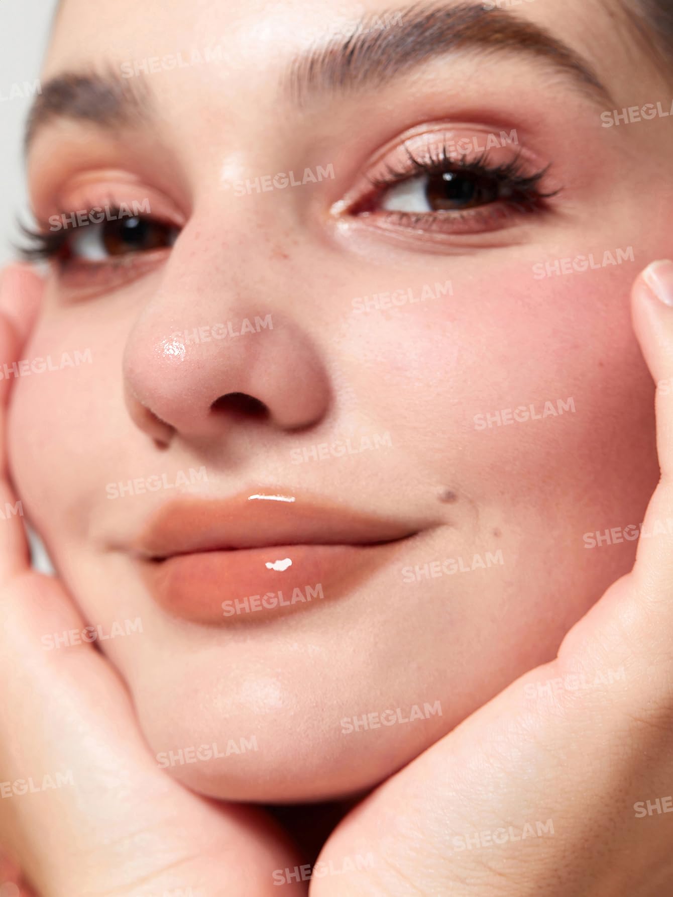 SHEGLAM close-up of solid gloss texture highlights creamy glide for comfortable wear