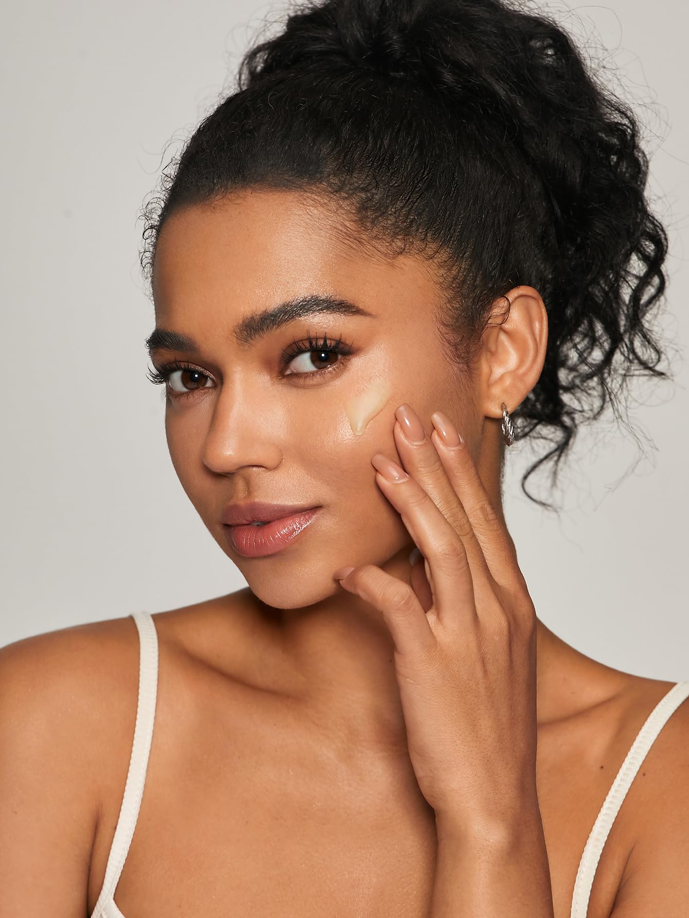 SHEGLAM primer on vanity in lifestyle setting conveying routine-ready benefit