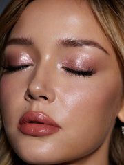 SHEGLAM Prismalight swatch on skin demonstrating buildable shine and blendability