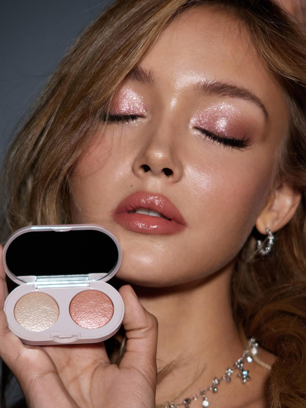 SHEGLAM Prismalight texture close-up showing micro-shimmer and smooth finish