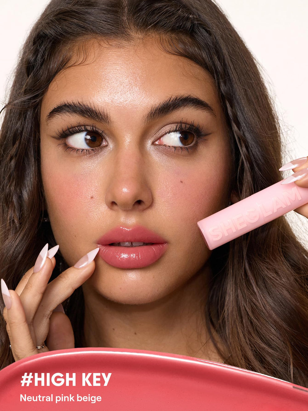 SHEGLAM texture swipe on hand highlighting silky, non-greasy hydration
