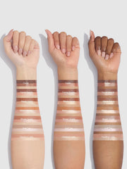 SHEGLAM stick in hand to show portable size for touch-ups on the go