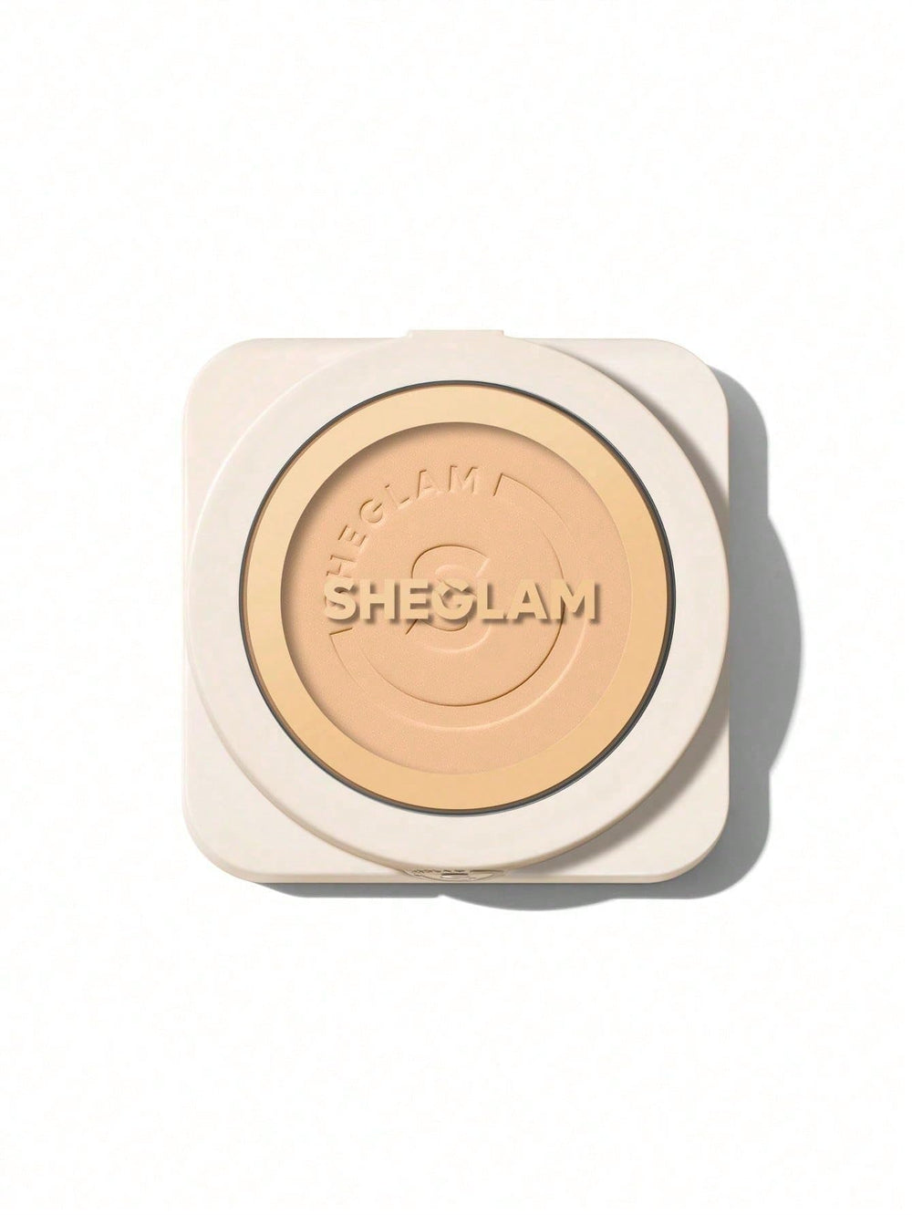 SHEGLAM compact front view showing sleek packaging and full coverage benefit