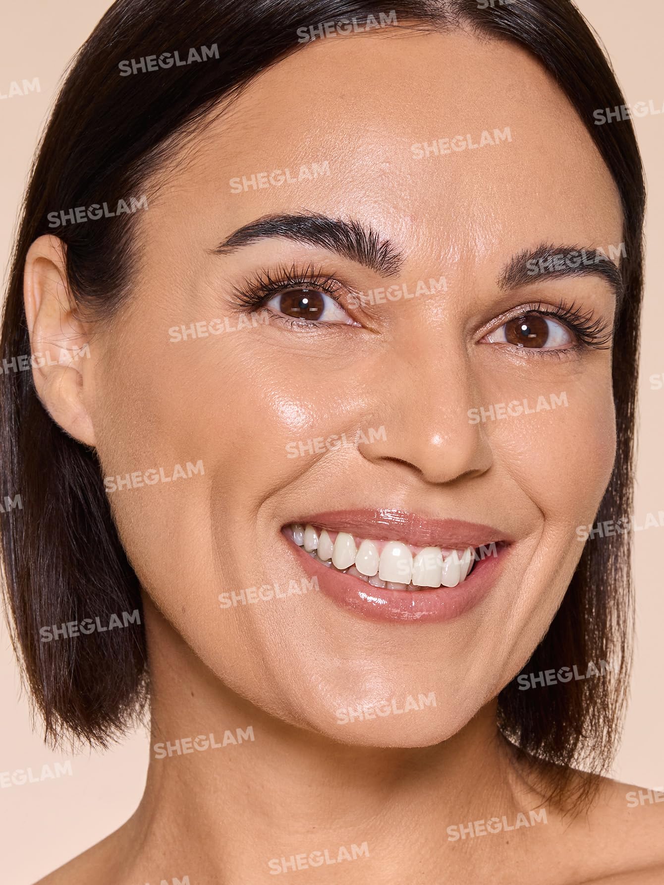 SHEGLAM Skin Magnet swatch on arm showing Sand shade and even tone