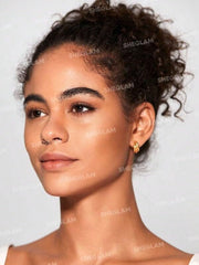 SHEGLAM arm swatches of Earthy Sepia showing rich pigment and blendable coverage
