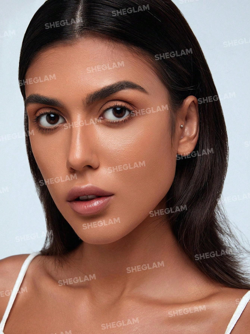 SHEGLAM open twist-up tip of stick revealing creamy applicator for precise lines