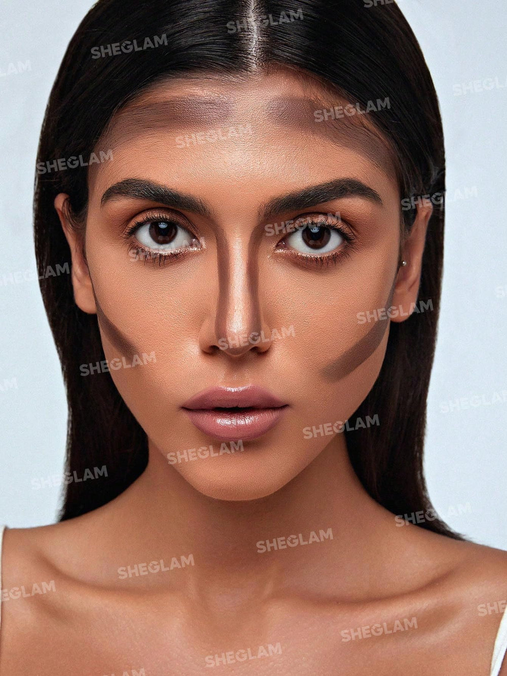 SHEGLAM swatch of Camel Suede on arm showing smooth, buildable texture