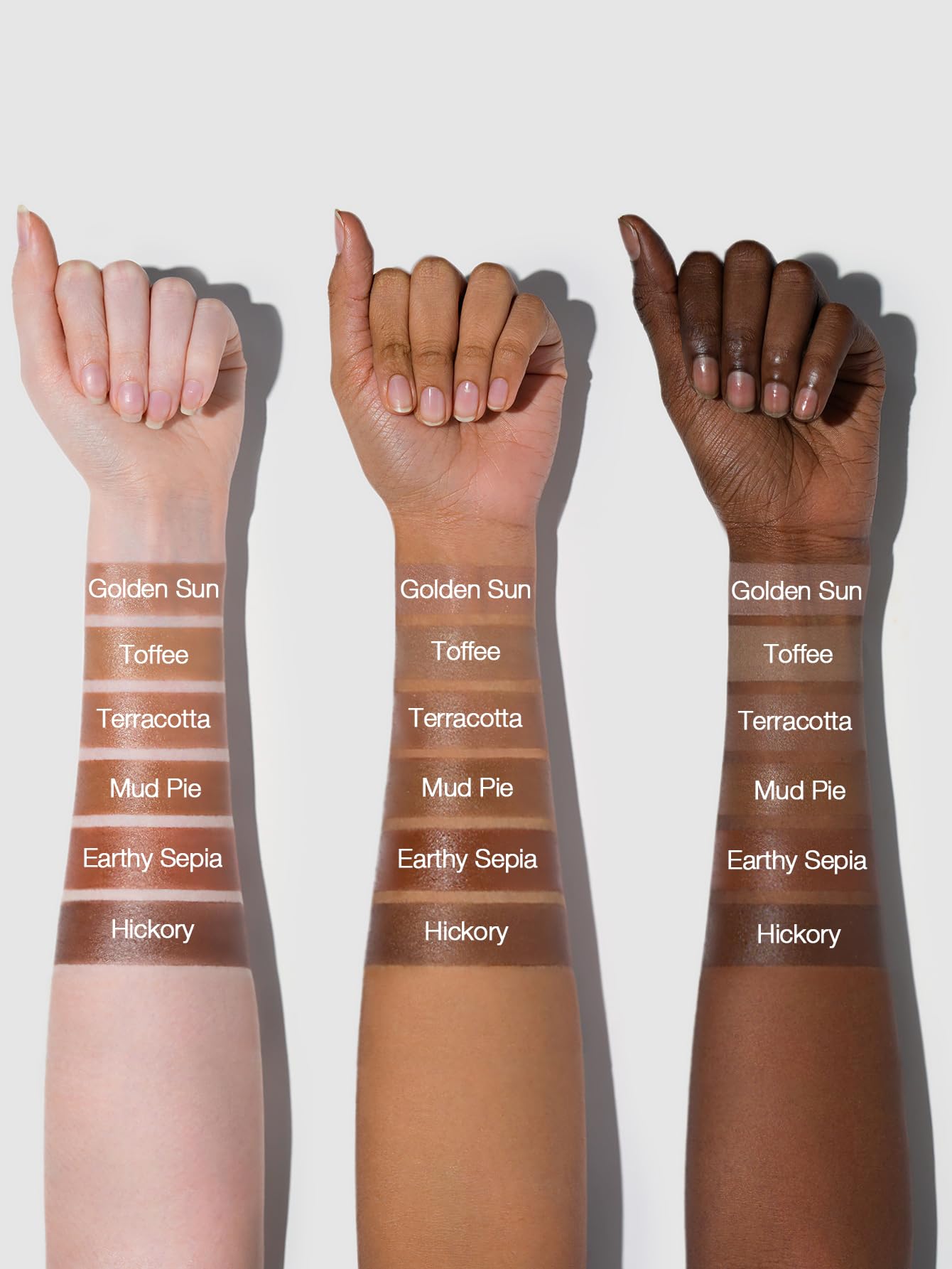 SHEGLAM bronzer in hand to show portable size and easy application