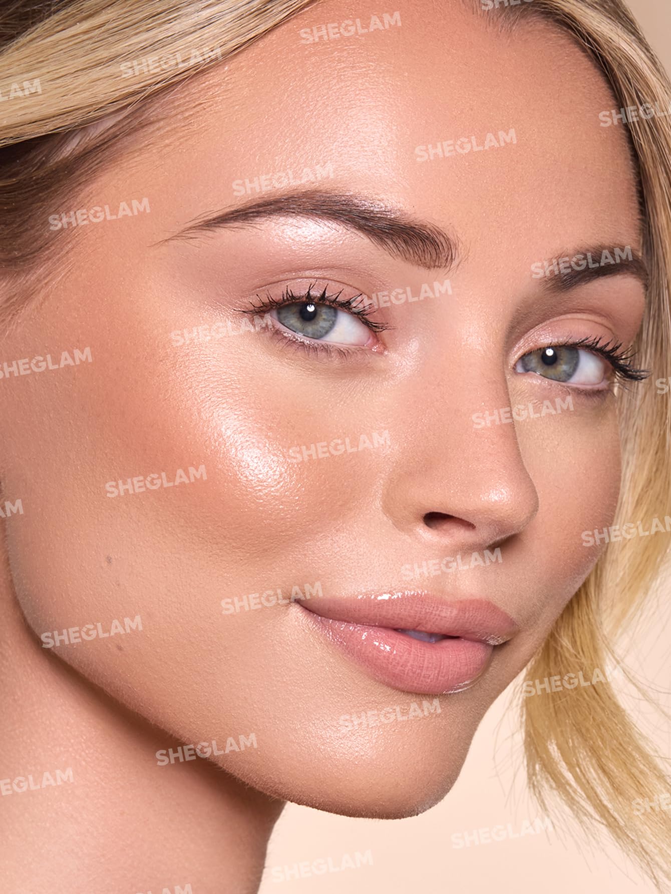 SHEGLAM texture swipe of terracotta bronzer showing creamy shimmer