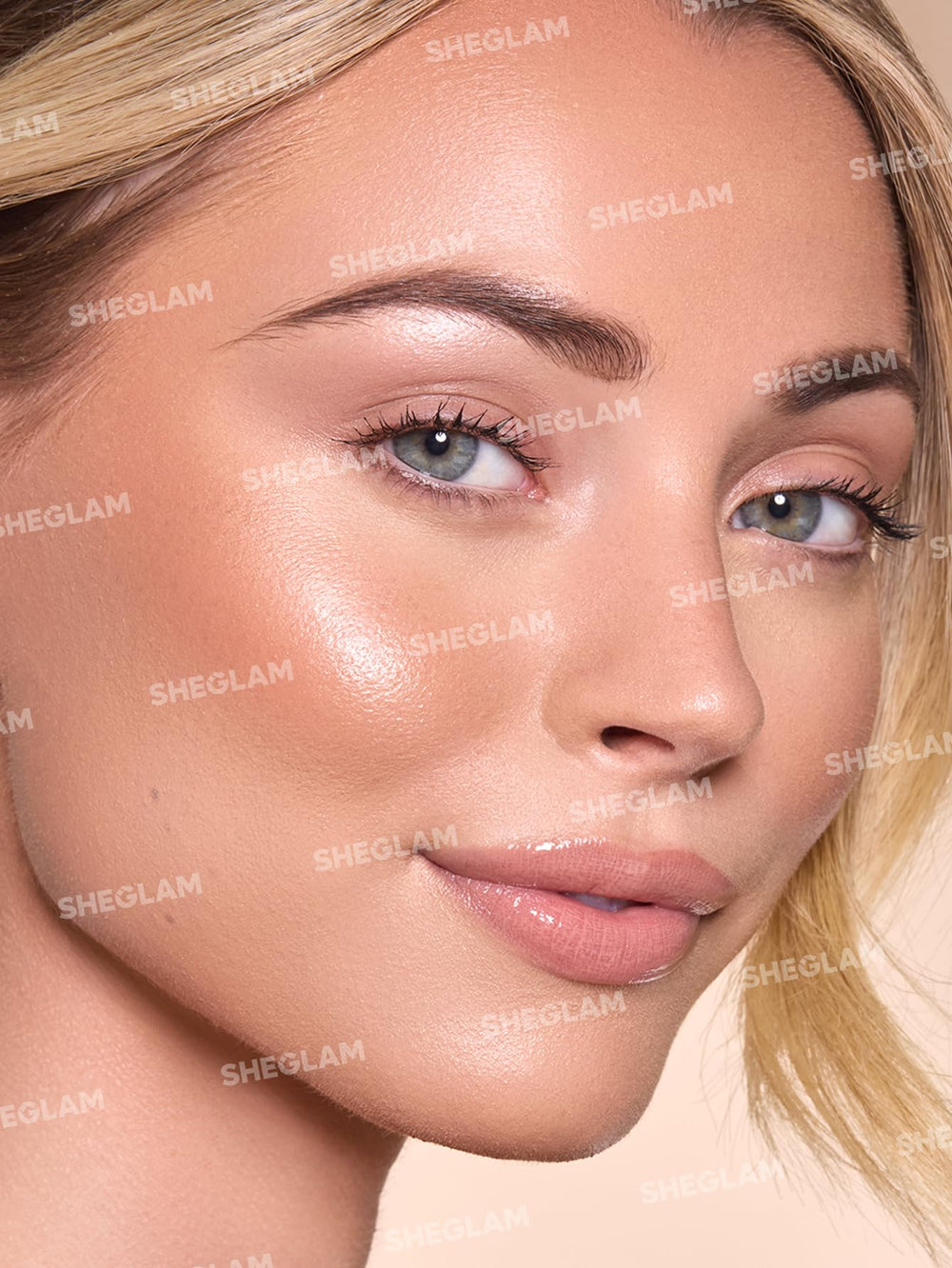 SHEGLAM texture swipe of terracotta bronzer showing creamy shimmer
