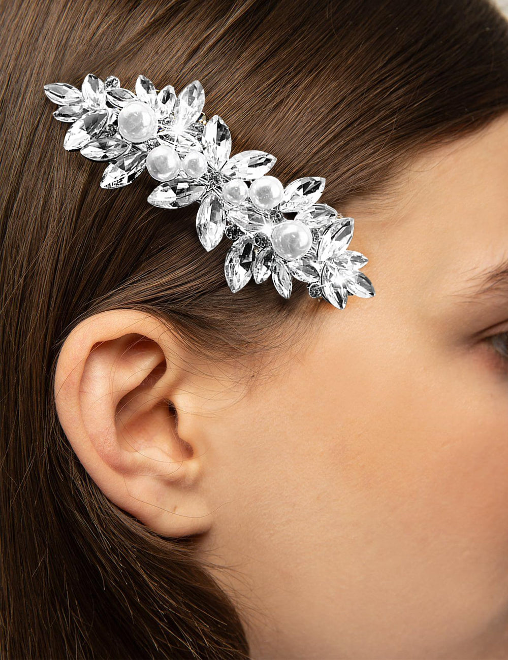 SHEHARUHI clips styled on loose waves, adds glamorous detail for photos