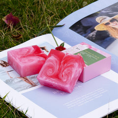 Shibarcle soap held in a hand to show 3.53oz scale and travel-friendly size