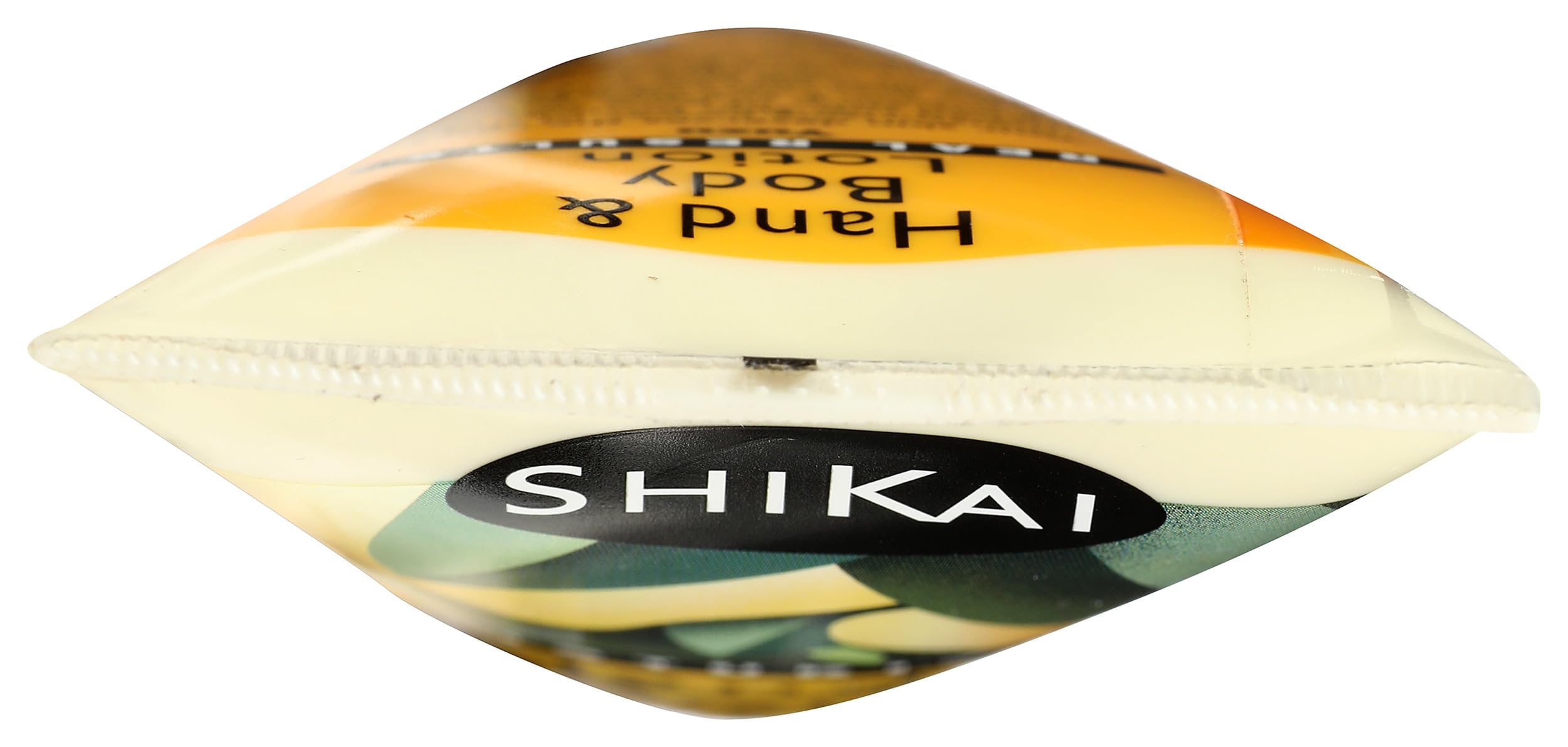 ShiKai yuzu size comparison next to hand showing convenient 8oz travel-friendly bottle