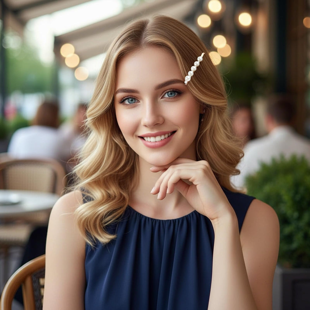 Shimmeroo hairpin held in hand to show compact size and comfortable wear