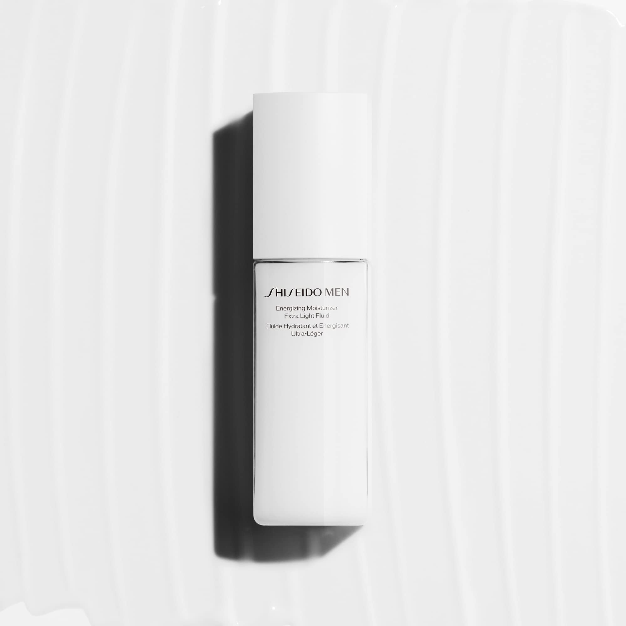 Shiseido on bathroom shelf beside grooming items showing routine fit
