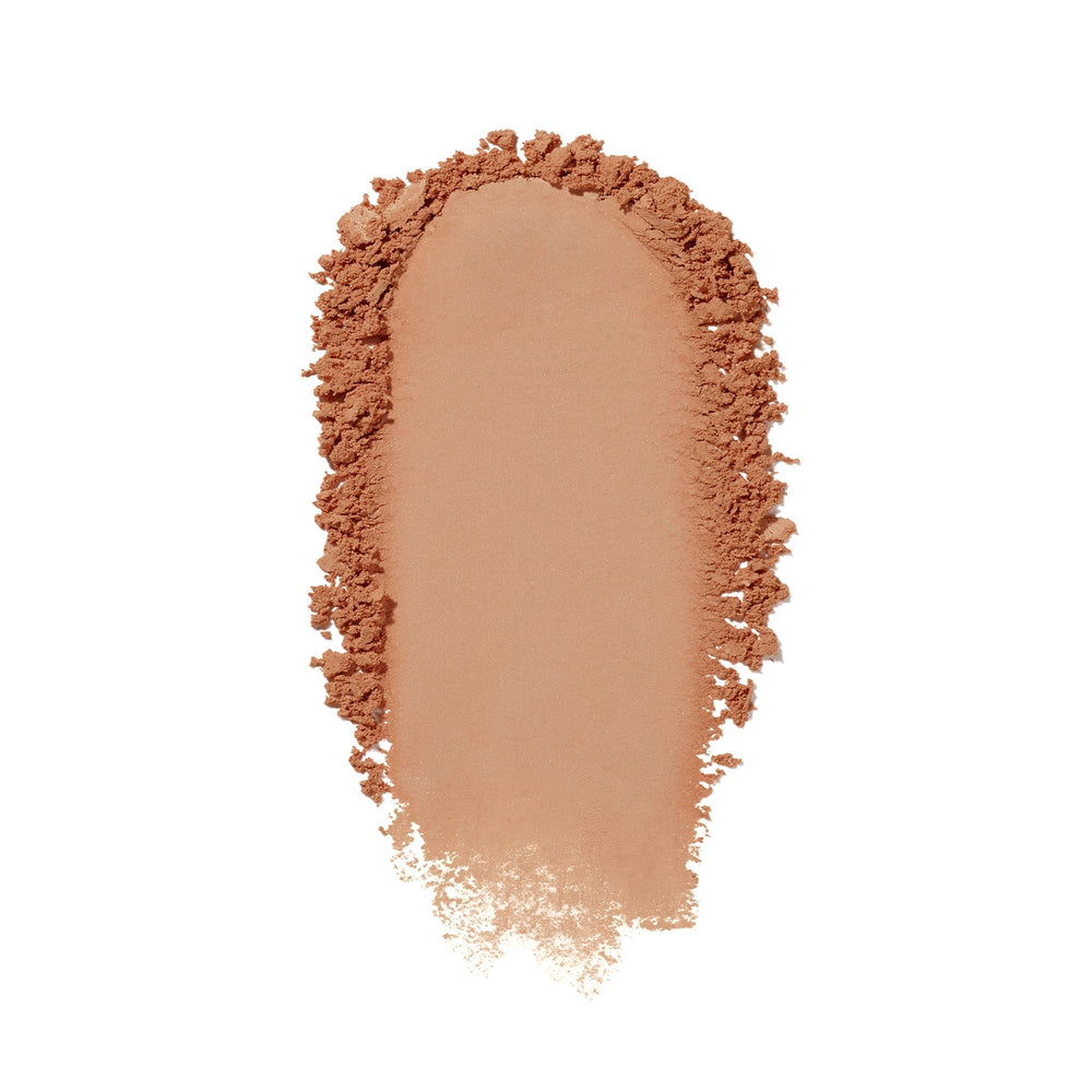 Shiseido close-up of pressed powder texture highlighting smooth blendability and coverage