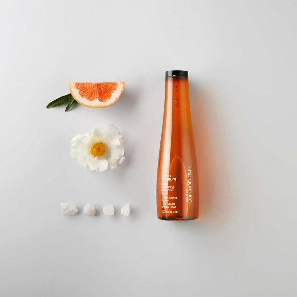 shu uemura in-shower application on wet hair illustrating detangling and frizz reduction benefit